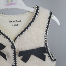 Load image into Gallery viewer, Cream Borg Gilet with Black Bows
