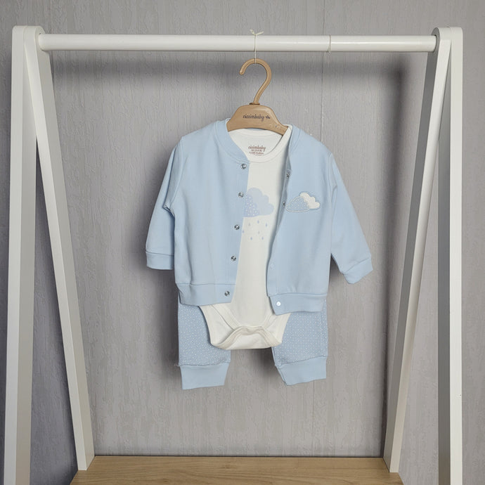 Baby blue 3 piece jogger set for baby boy includes pale blue cuffed joggers with white polka dot design, a white vest with cloud to front and matching pale blue popper button jacket with matching cloud motif. Super soft and comfy to wear