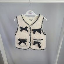 Load image into Gallery viewer, Cream Borg Gilet with Black Bows
