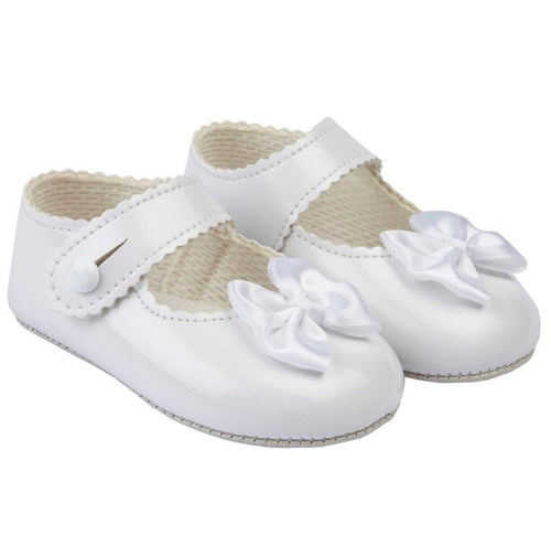 Baypods soft soled baby shoes for pre walker in a patent white colour with ankle strap and small bow detail