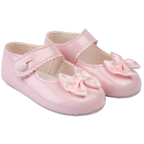 Baypods baby soft sole shoes in a patent pale pink colour with ankle strap and small bow detail